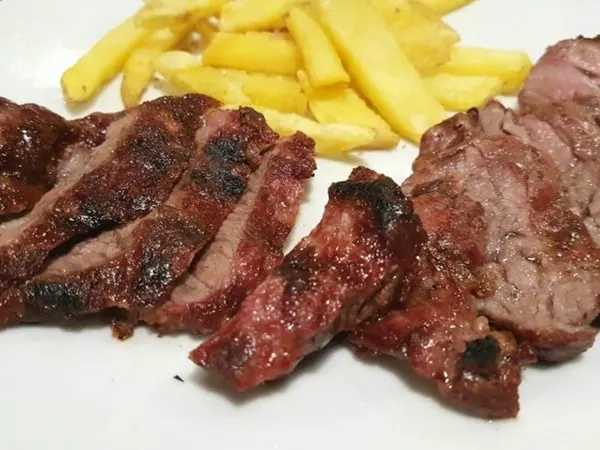 Presa ibérica de bellota a la brasa
